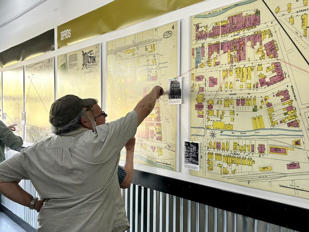 Visitor interacting with maps