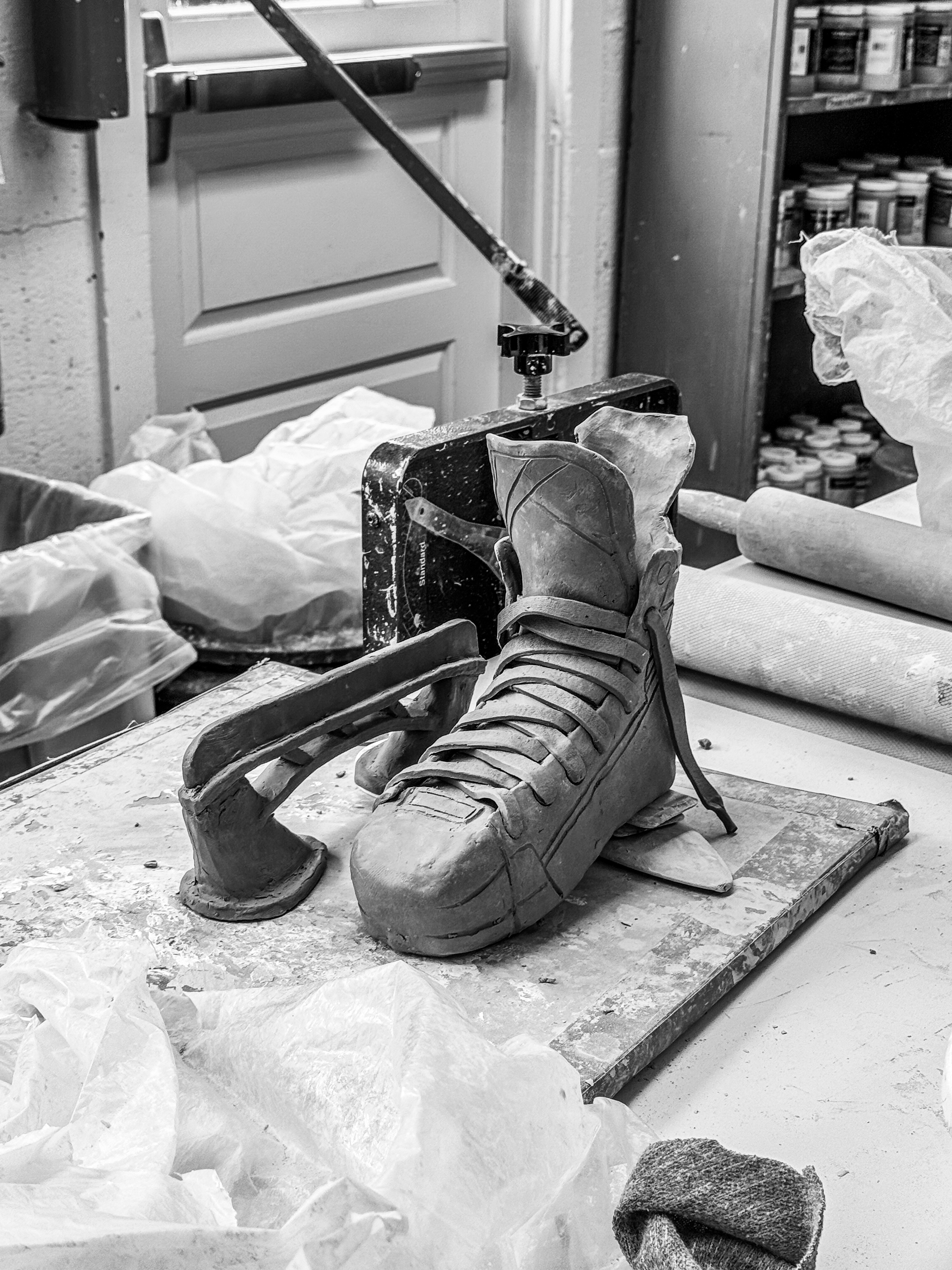 Clay ice skate sculpture in progress